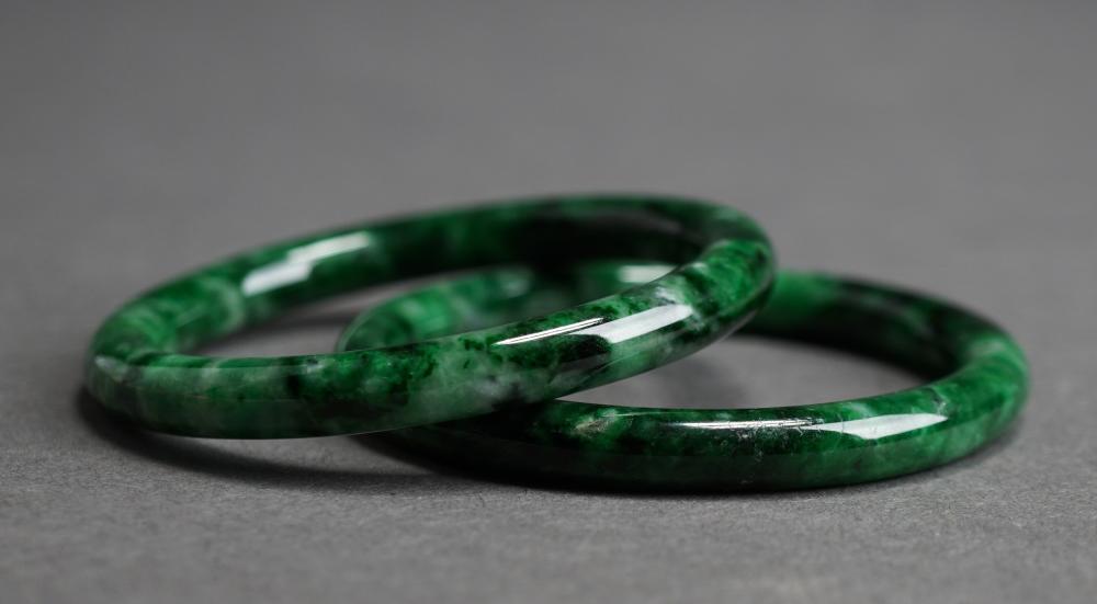 PAIR OF DARK GREEN JADE BANGLE