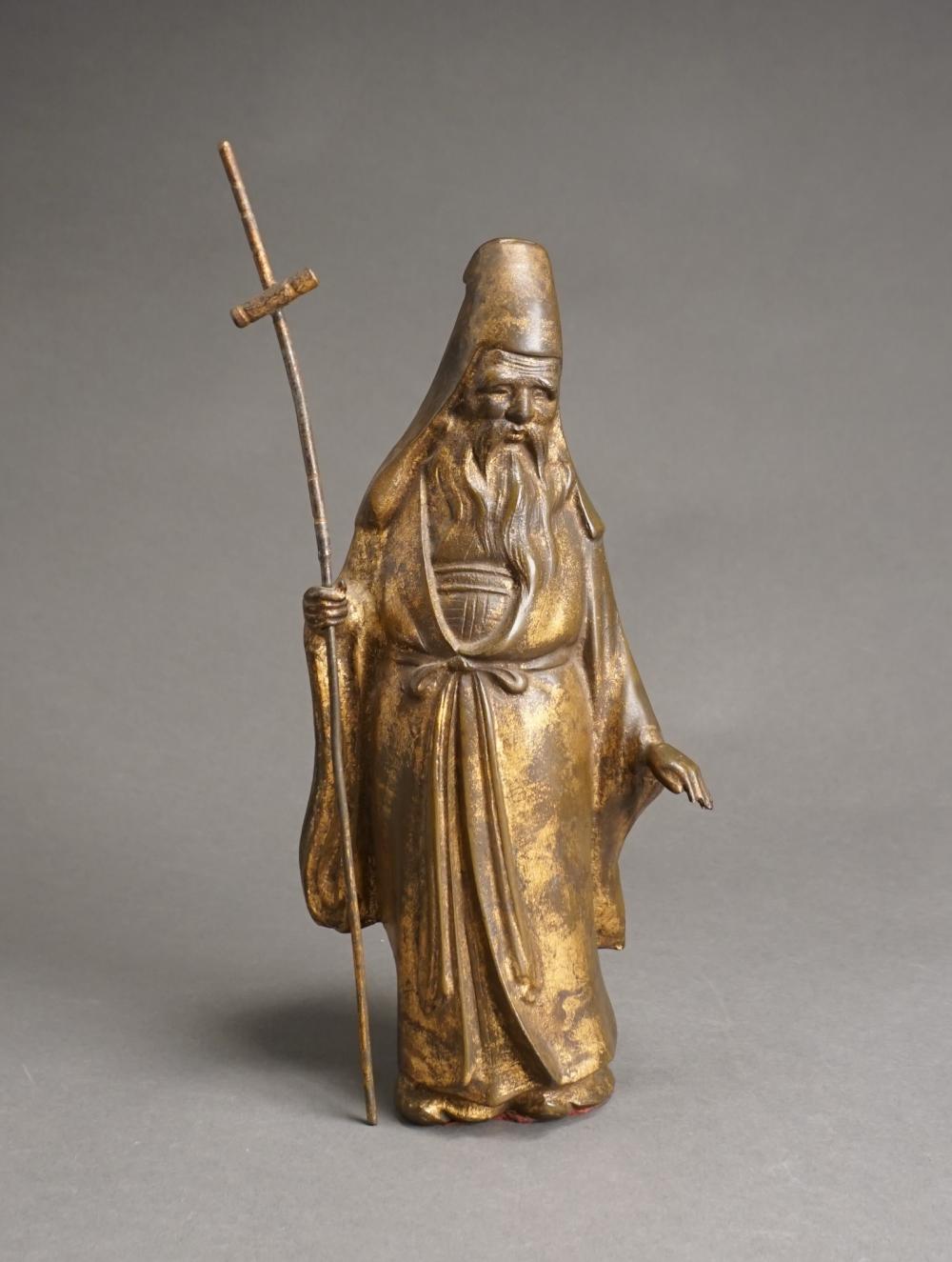 CHINESE BRONZE FIGURE OF A TRAVELING