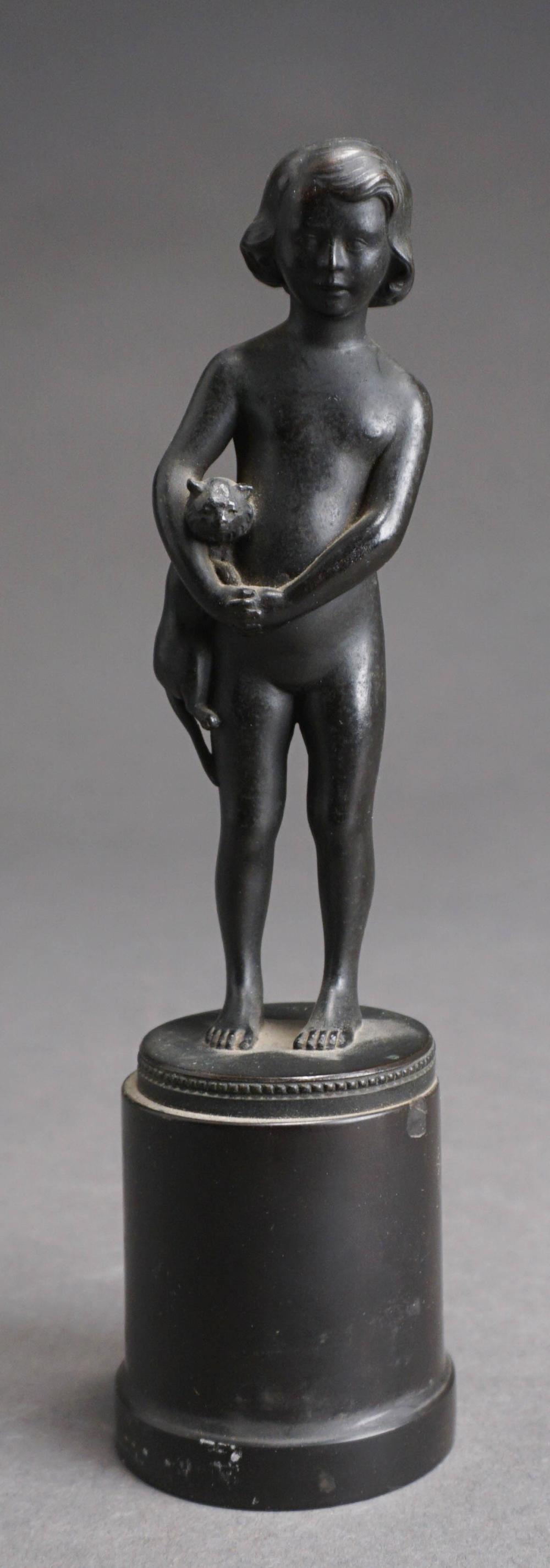 BRONZE FIGURE OF YOUNG CHILD HOLDING