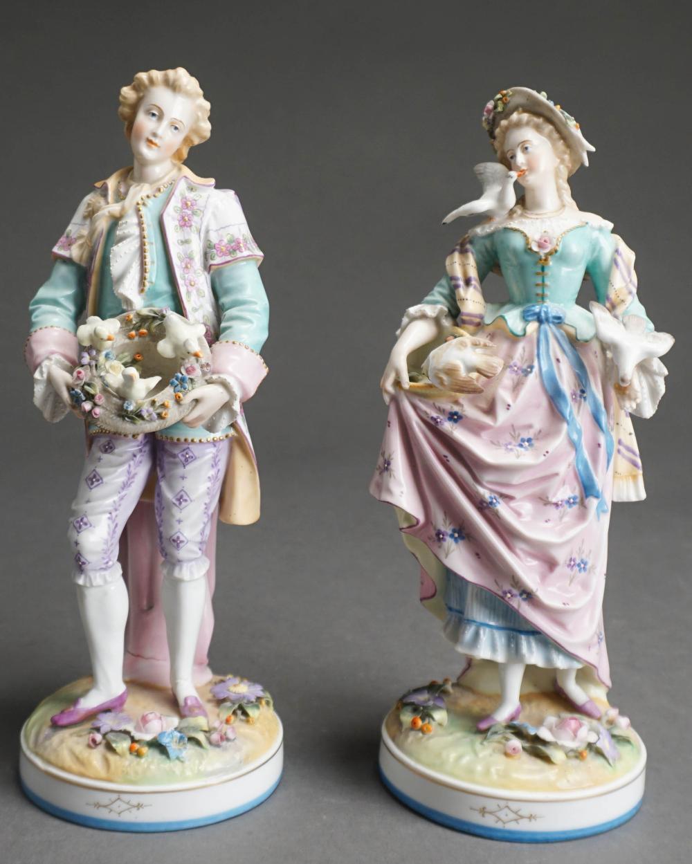 PAIR OF CONTINENTAL BISQUE FIGURINES