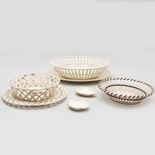 GROUP OF CREAMWARE BASKETS AND