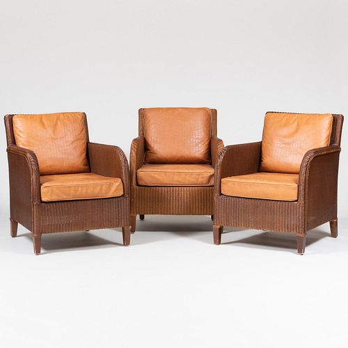 THREE CONTEMPORARY WICKER AND LEATHER