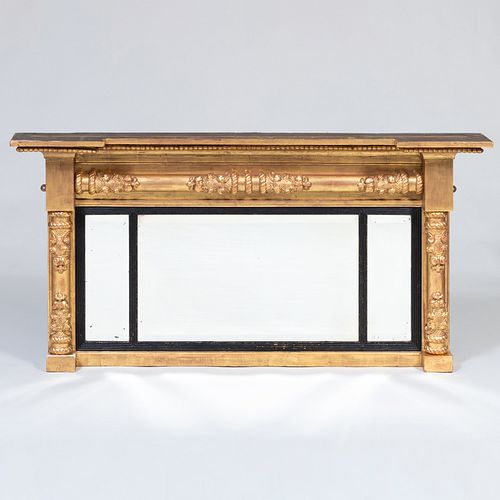 CLASSICAL EBONIZED AND CARVED GILTWOOD