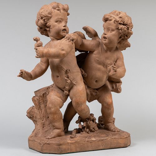 PAIR OF TERRACOTTA PUTTI AT PLAYUnsigned.

23
