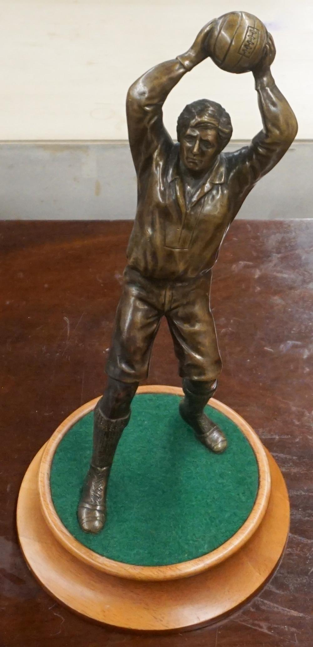 BRONZE FIGURE OF RUGBY PLAYER,