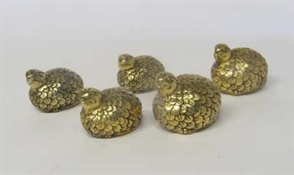 Set of five Gucci gilt metal novelty 4a0dd