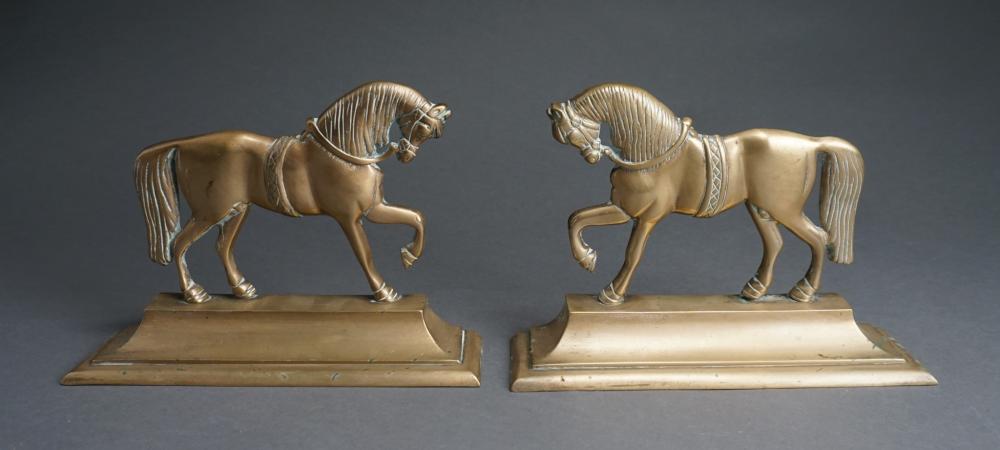 PAIR OF BRASS PRANCING HORSE-FORM