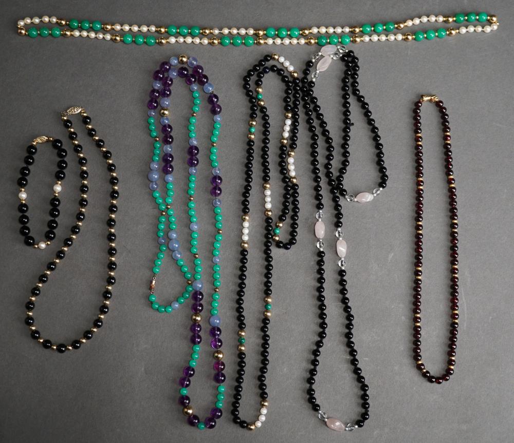 SIX BEADED NECKLACES AND ONE BRACELETSix 2e4a56