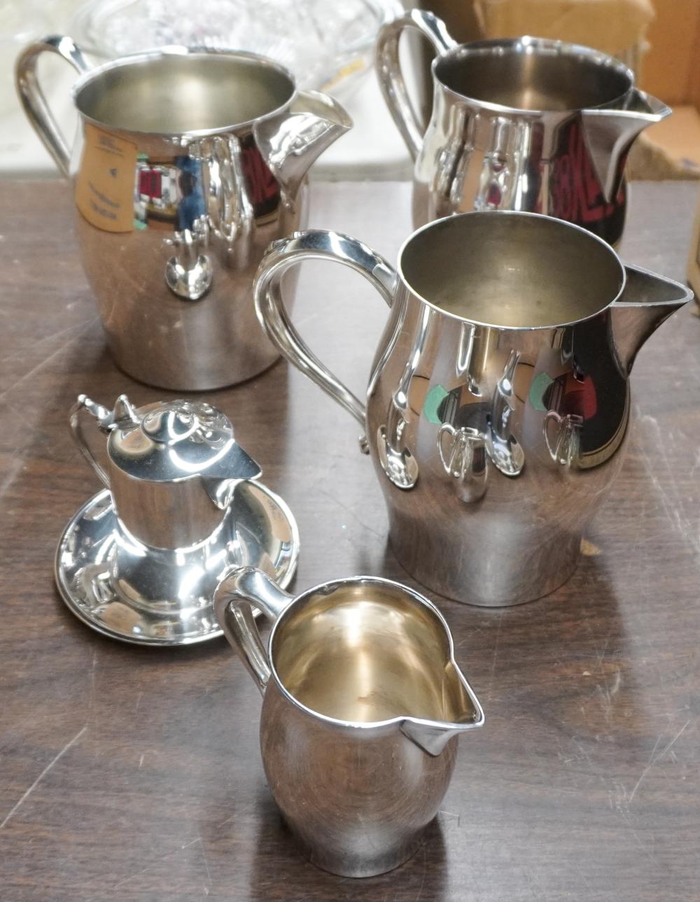 GROUP OF FIVE SILVERPLATE PITCHERSGroup