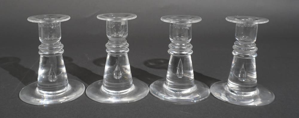 FOUR STEUBEN CRYSTAL CANDLE HOLDERS,