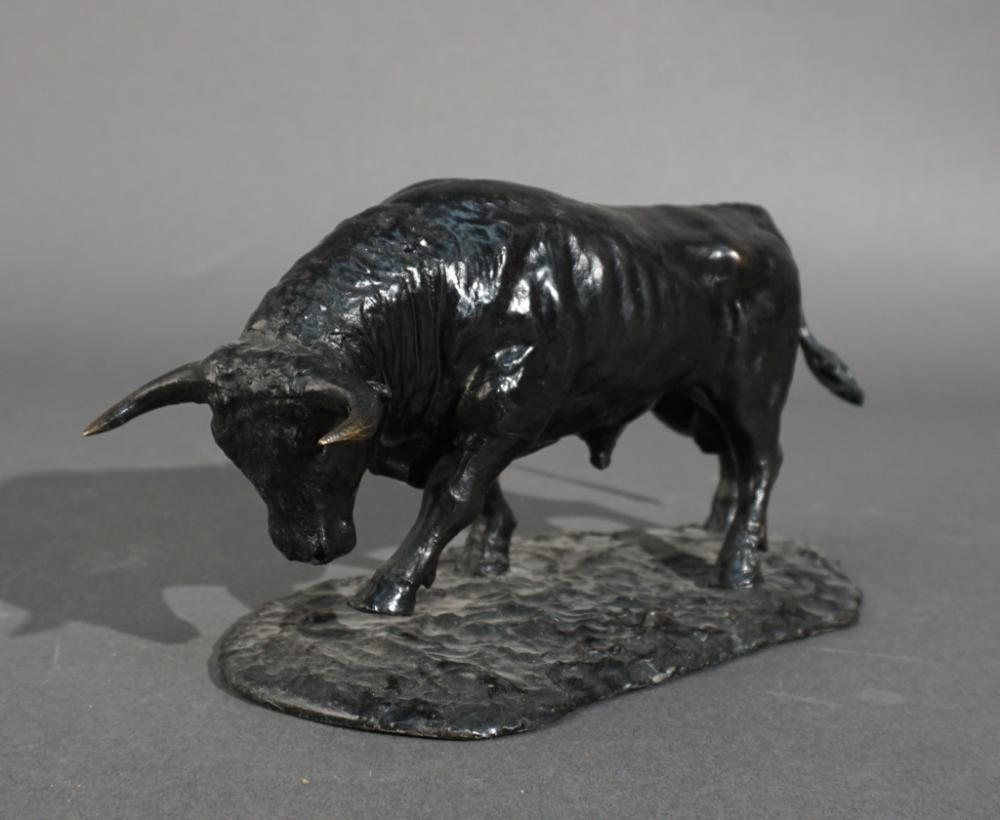 BLACK PAINTED METAL FIGURE OF A BULL,