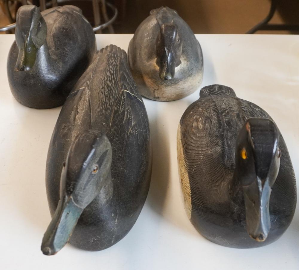 GROUP OF FOUR PAINTED WOOD DUCK DECOYSGroup