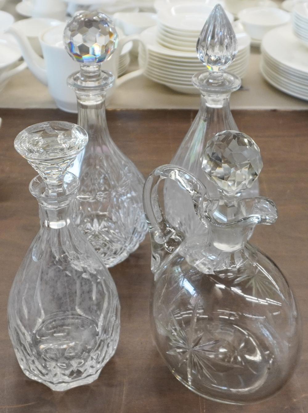 THREE CRYSTAL DECANTERS AND A CARAFE  2e76f9