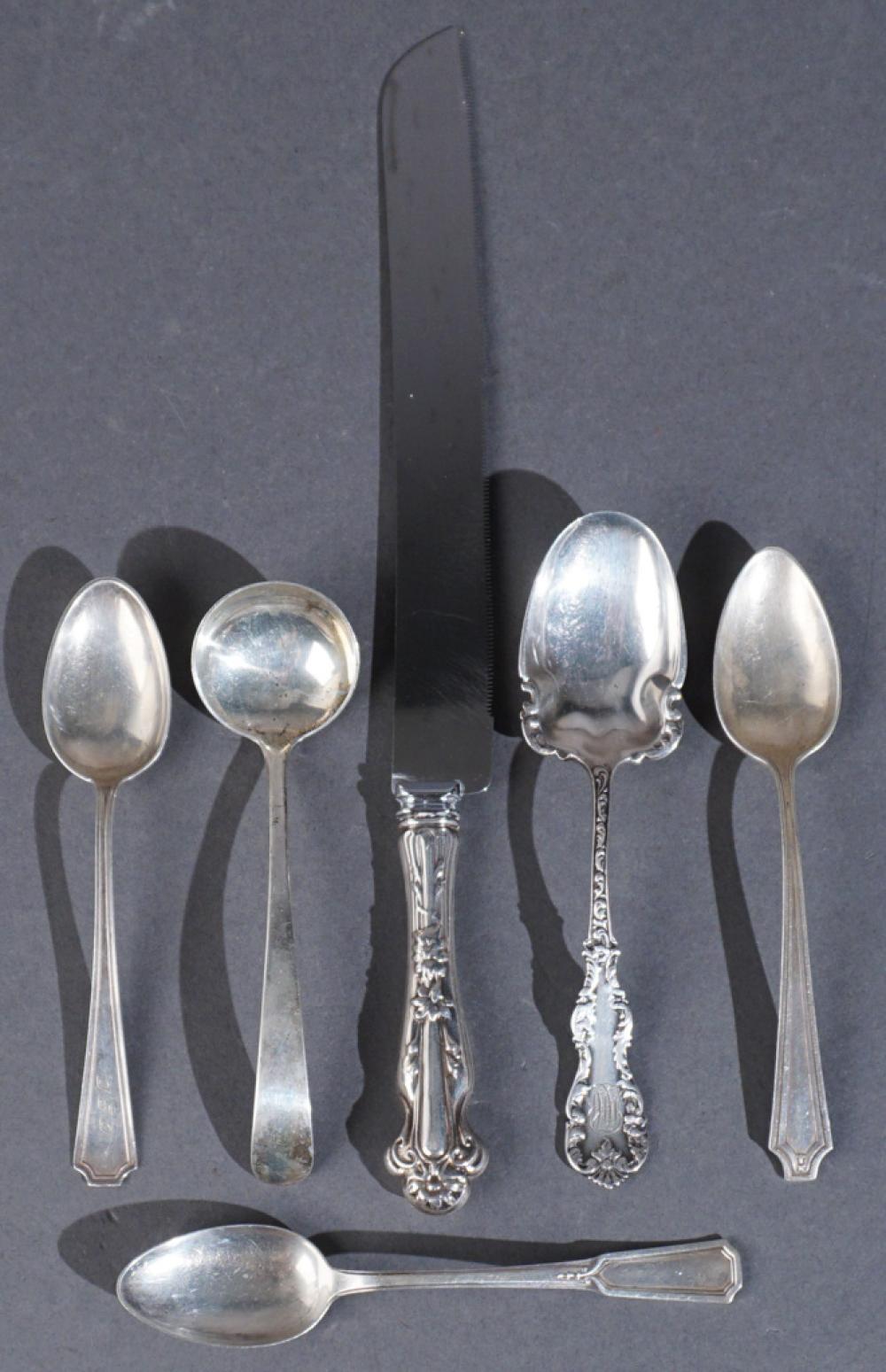 FIVE FLAT STERLING SILVER TABLE