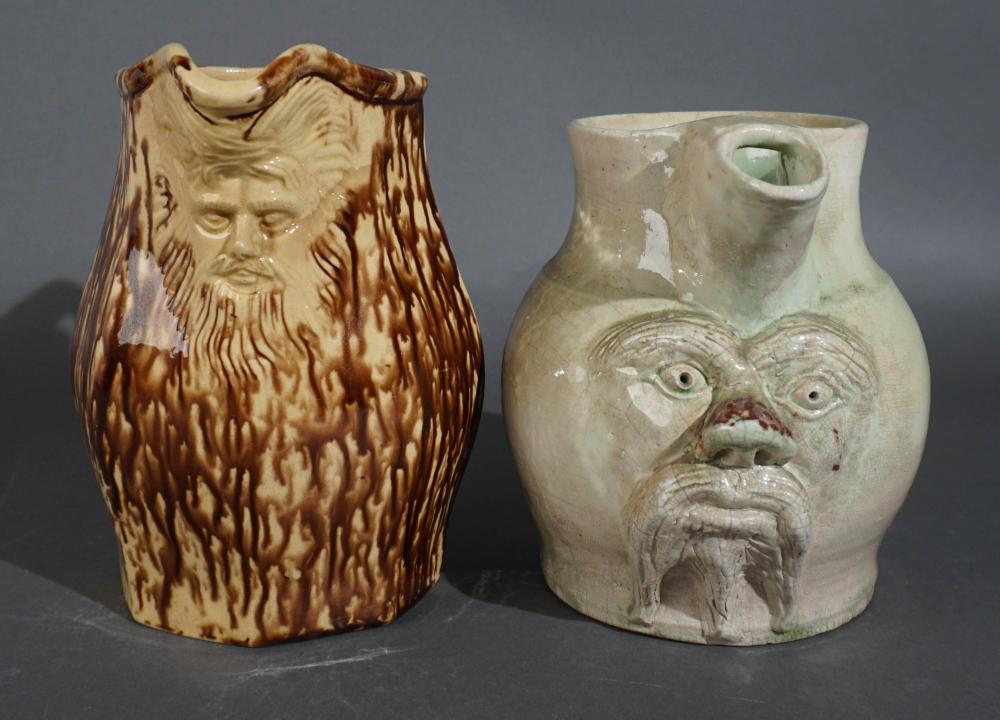 TWO GLAZED CERAMIC FACE JUGS, H OF