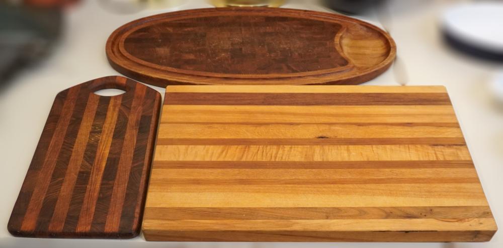 THREE MIXED WOOD CUTTING BOARDS  2e7e30