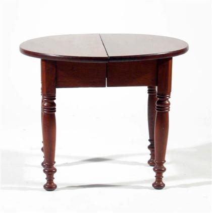 Walnut side table    Round top over