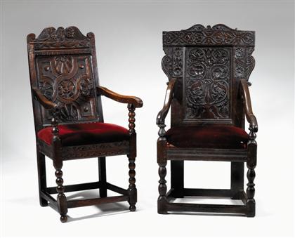 Two early English carved oak armchairs 4a653