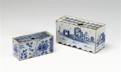 Two Delft blue and white flower bricks