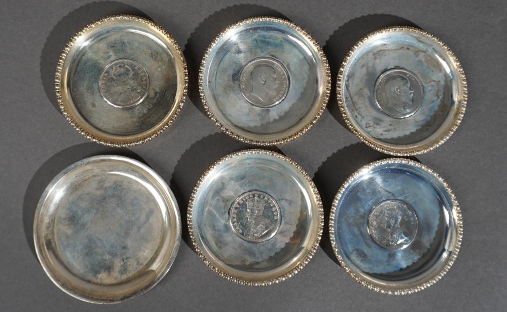 FIVE INDIAN SILVER AND COIN MOUNTED