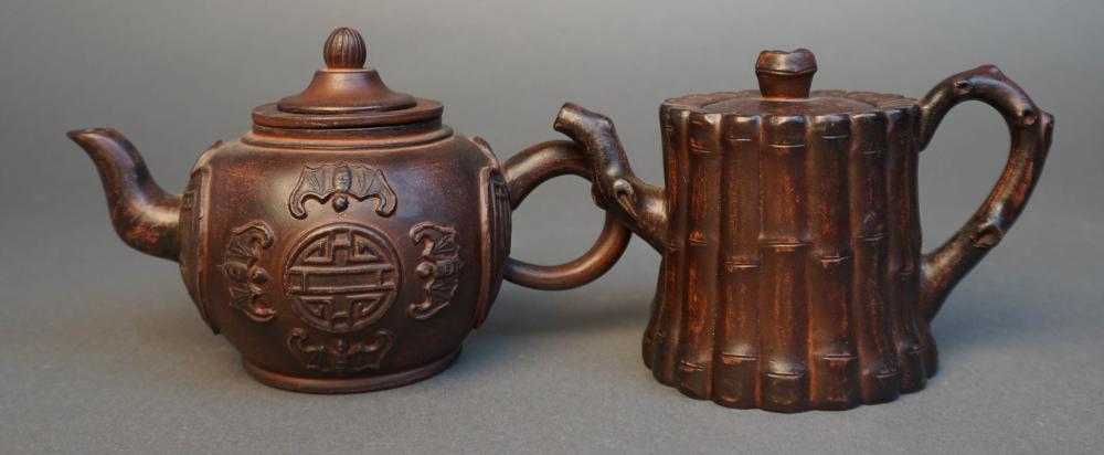 TWO YIXING TEAPOTS WITH COVERS