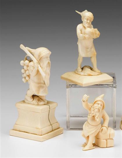 Group of three carved ivory figures 4a75c