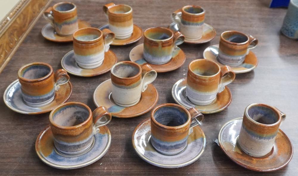 TWELVE PORCELAIN DEMITASSE CUPS AND