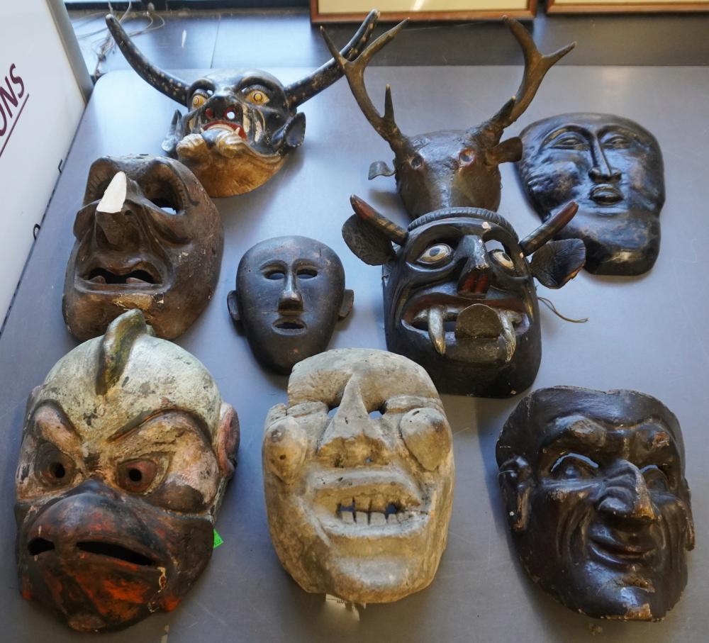 COLLECTION OF NINE CARVED MASKSCollection 2e89d7