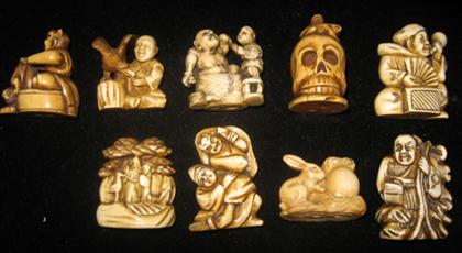 Nine Japanese ivory netsuke   