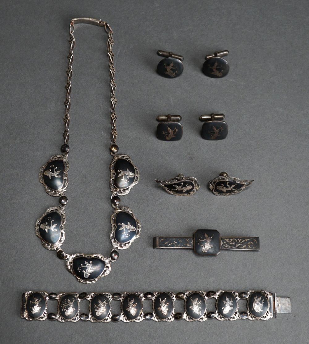 COLLECTION OF SIAMESE STERLING
