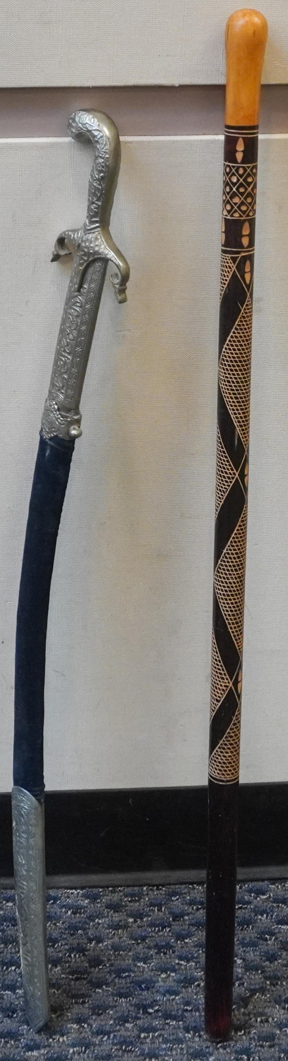 AFRICAN CARVED WOOD CANE AND A