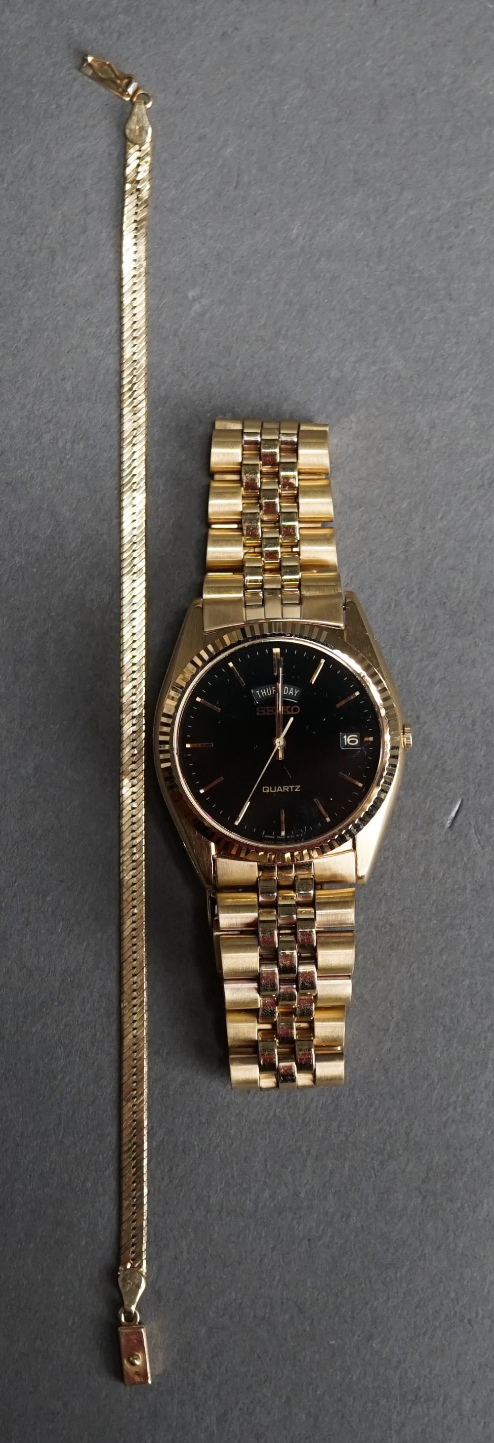 SEIKO QUARTZ WATCH WITH 14 KARAT 2e67de