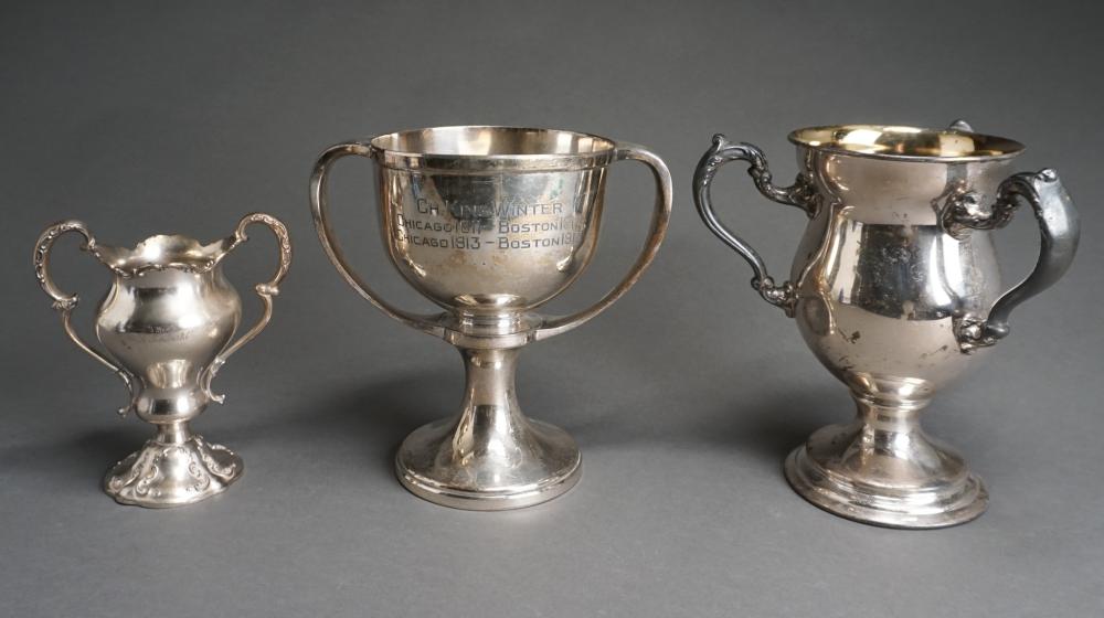 THREE SILVERPLATE TROPHIES, H OF