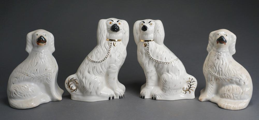 TWO PAIRS OF STAFFORDSHIRE SPANIELS,