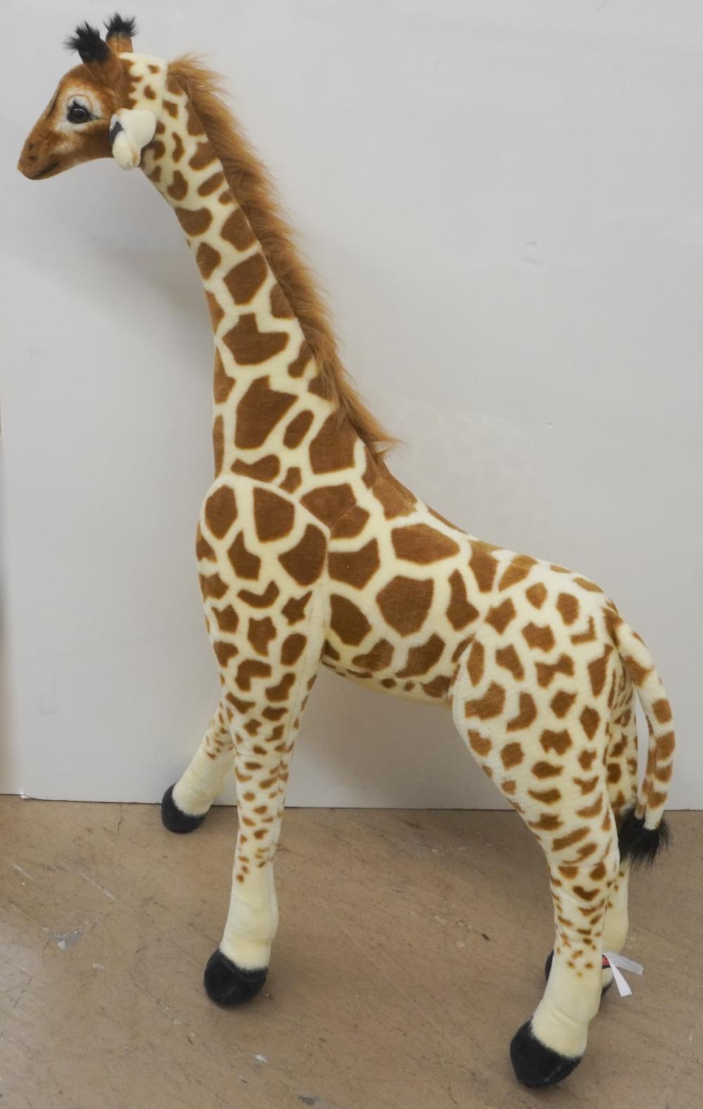 MELISSA AND DOUG STUFFED GIRAFFE,