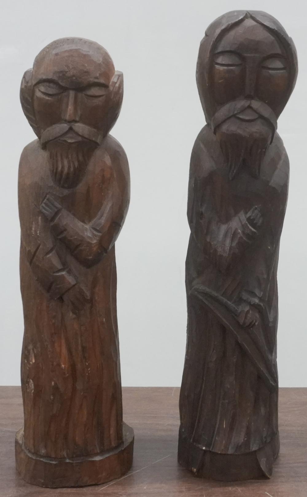 TWO CONTINENTAL CARVED OAK FIGURES