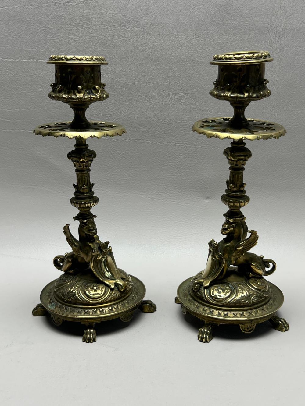 PAIR BRASS GRIFFIN FORM CANDLESTICKS  2e6f01