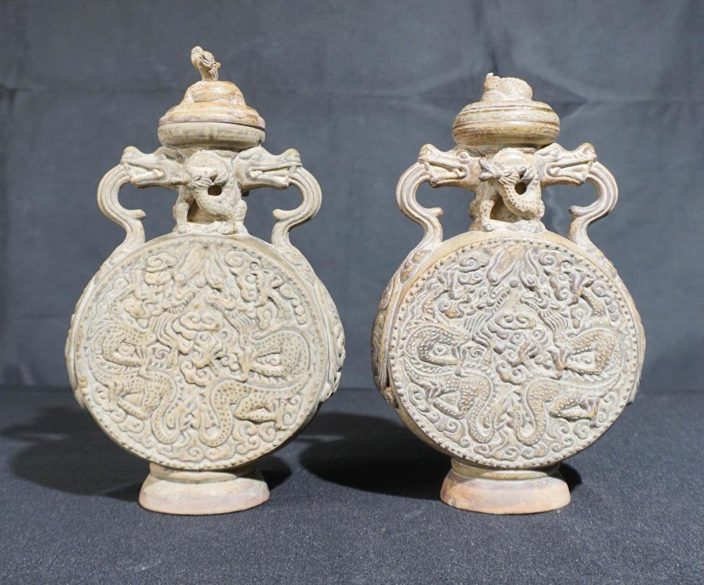 PAIR OF CHINESE CAST POTTERY COVERED 2e6f27