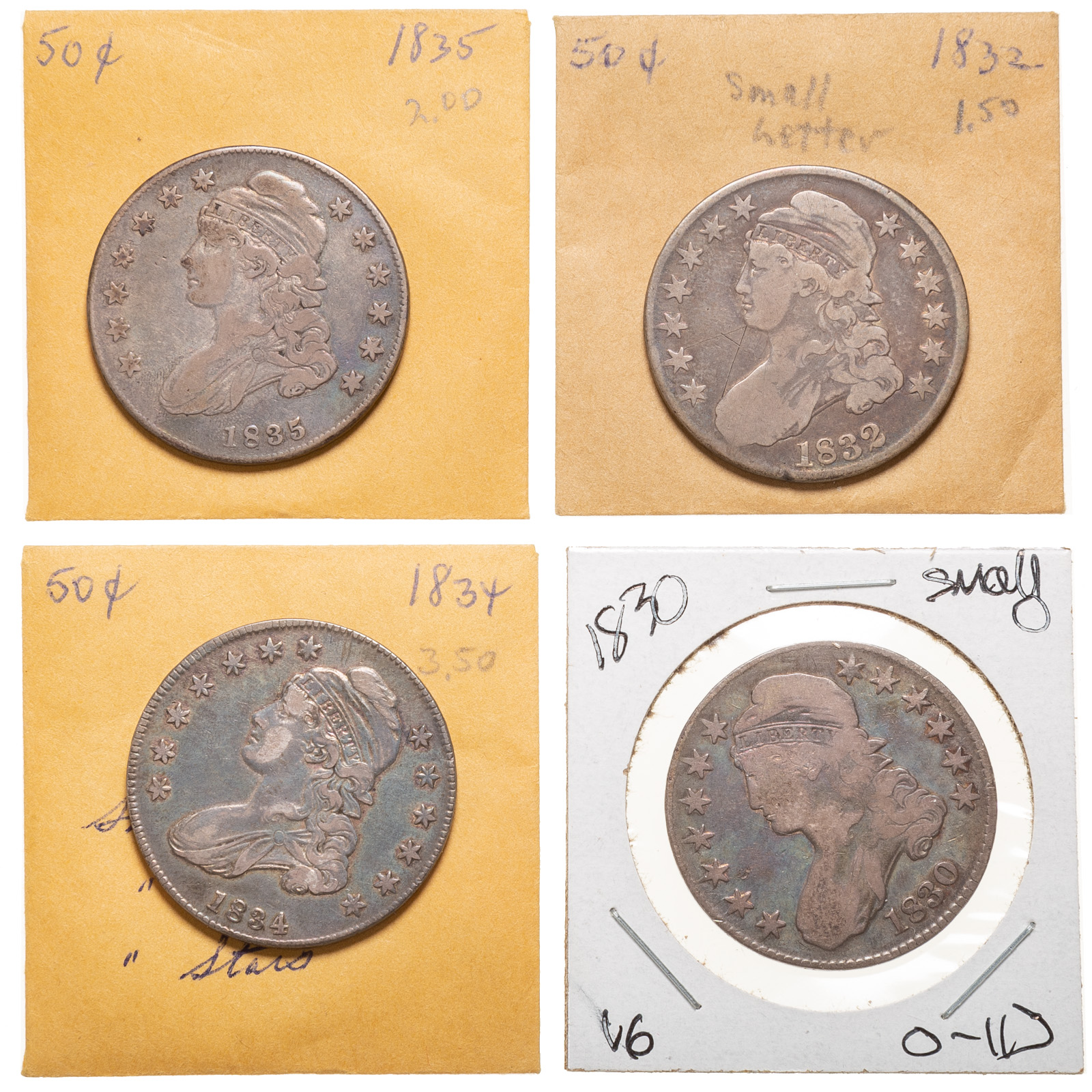 GROUP OF FOUR CAPPED BUST HALVES