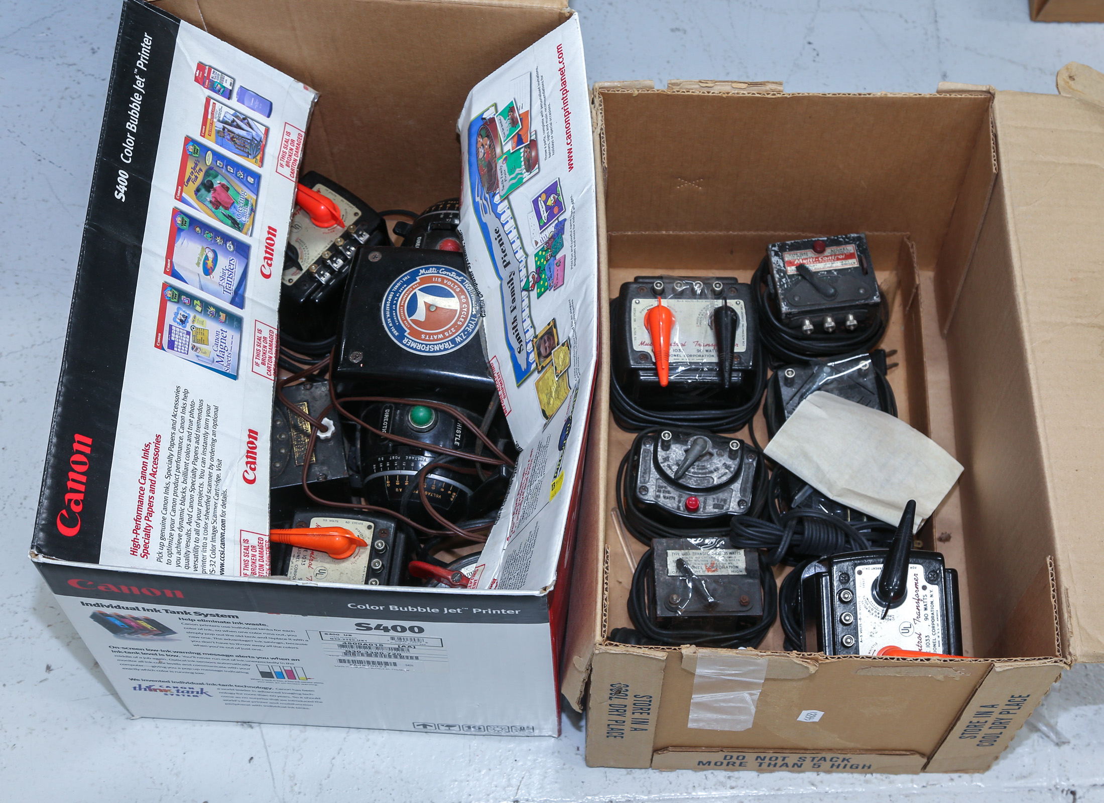 TWO BOXES OF LIONEL TRAIN TRANSFORMERS