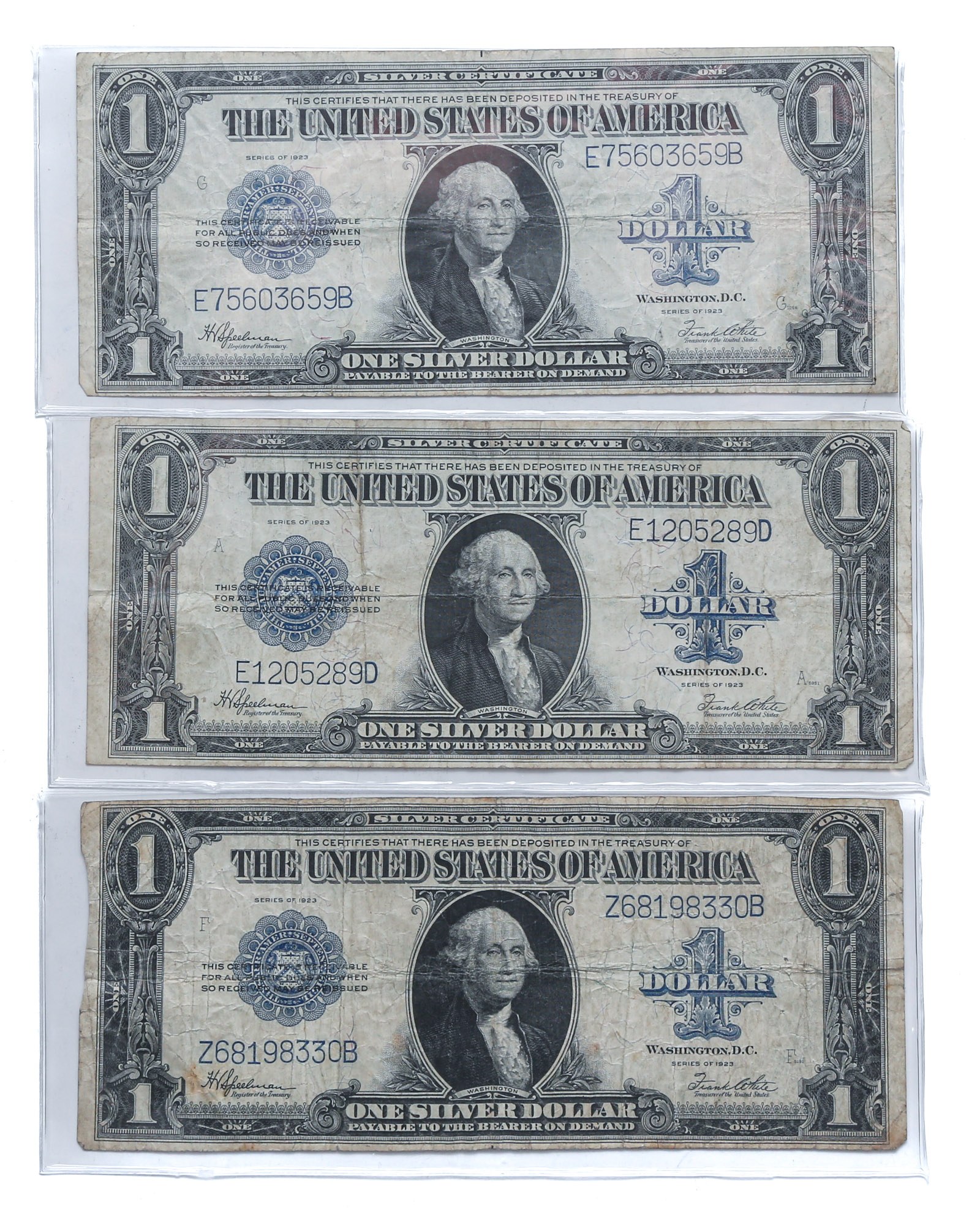 THREE 1923 LARGE SIZE $1 SILVER