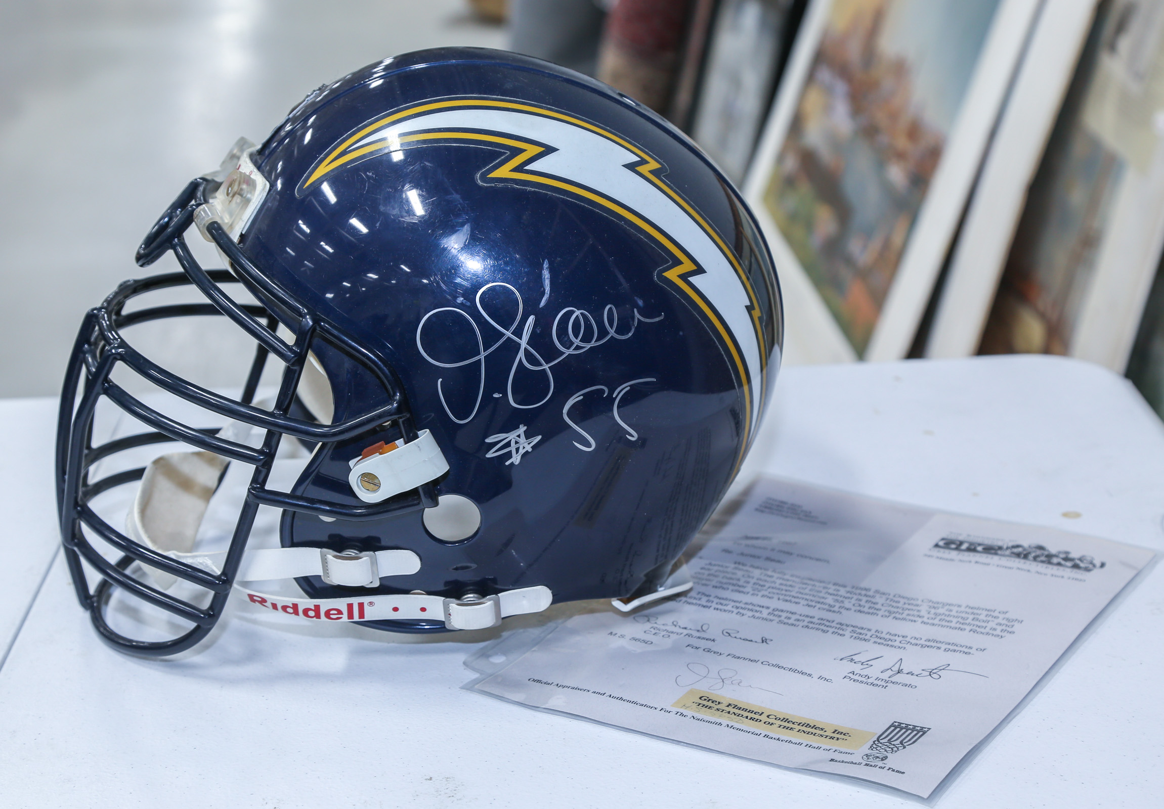 JUNIOR SEAU SIGNED GAME-USED FOOTBALL