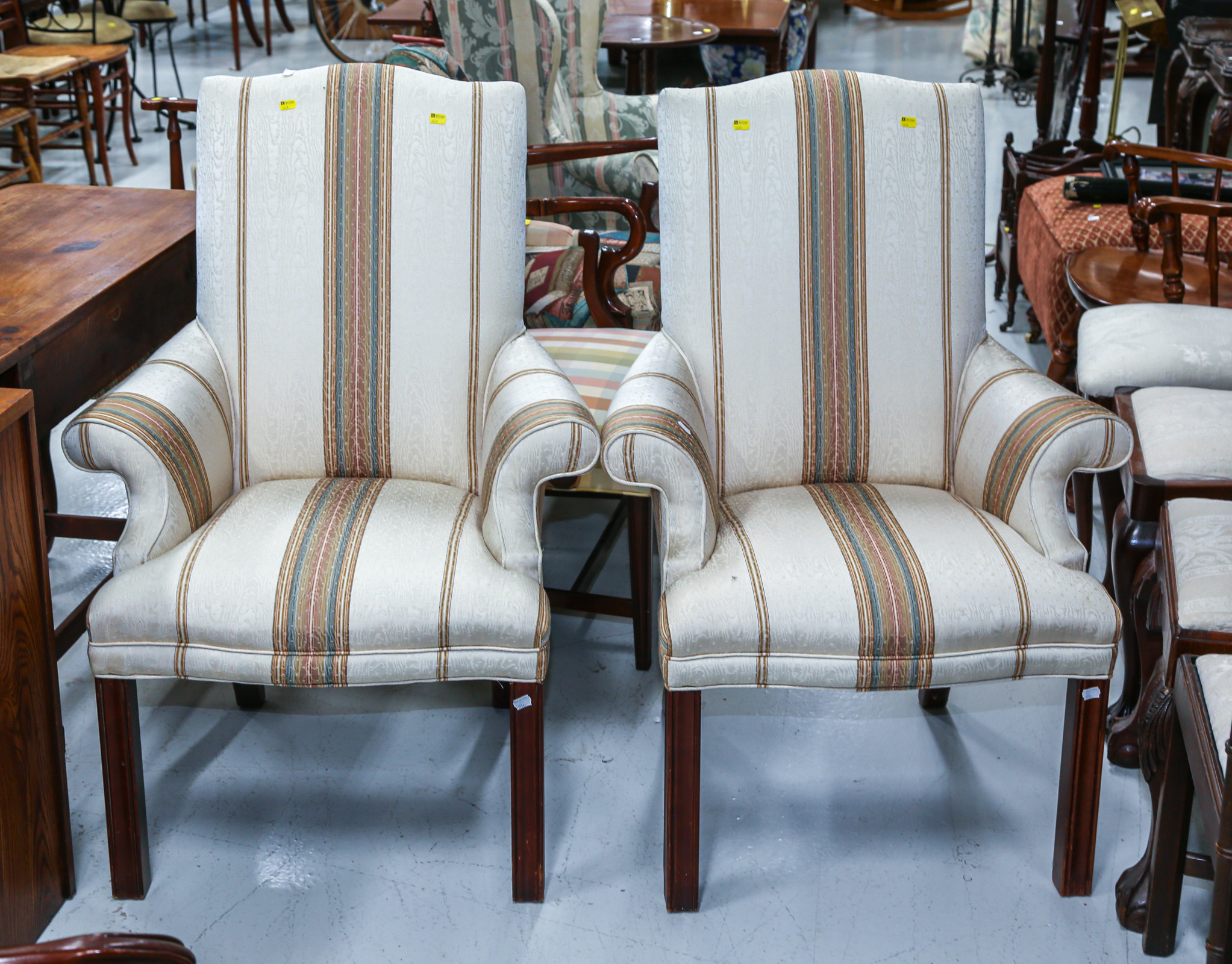 A PAIR OF CHIPPENDALE STYLE ARMCHAIRS