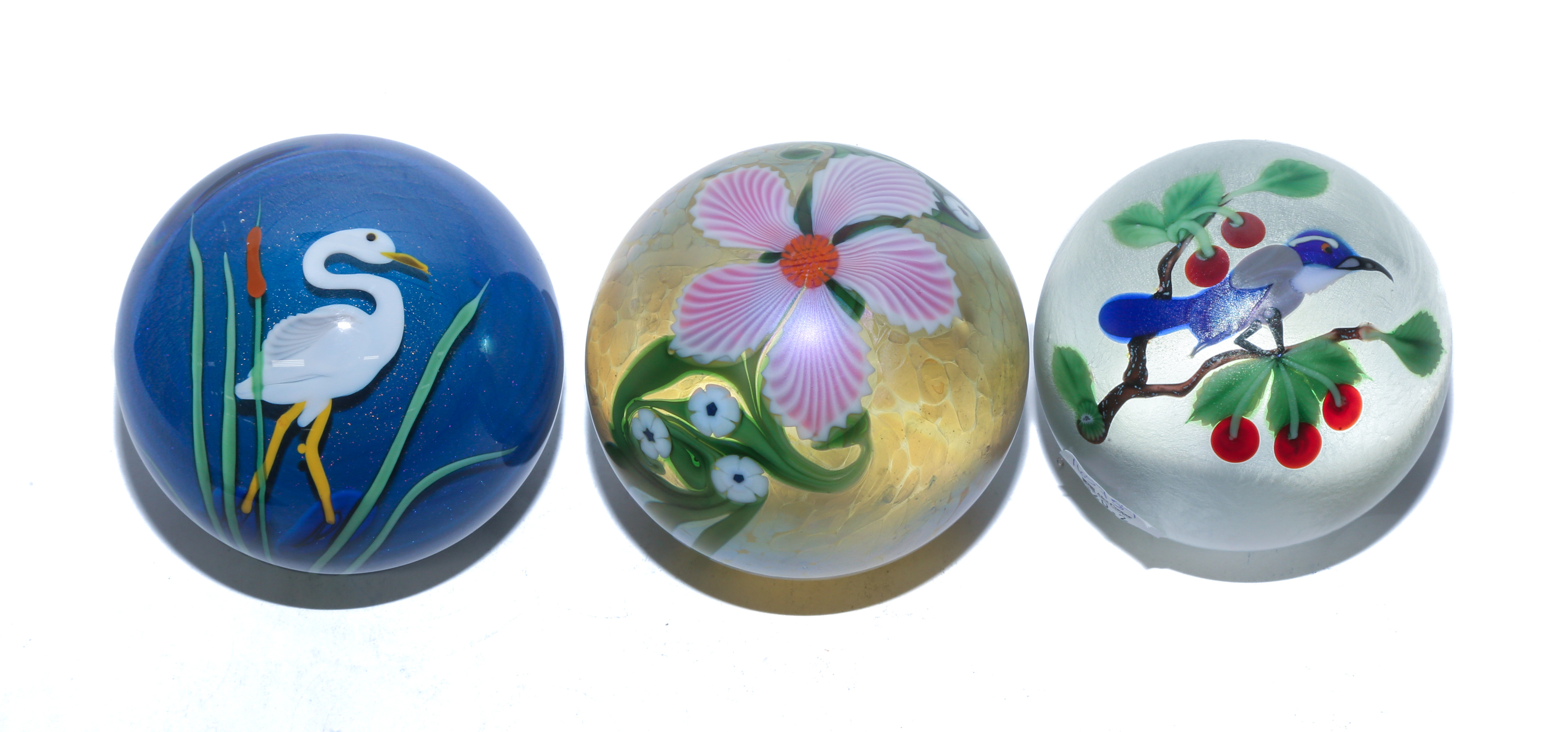 THREE ORIENT & FLUME PAPERWEIGHTS Comprising