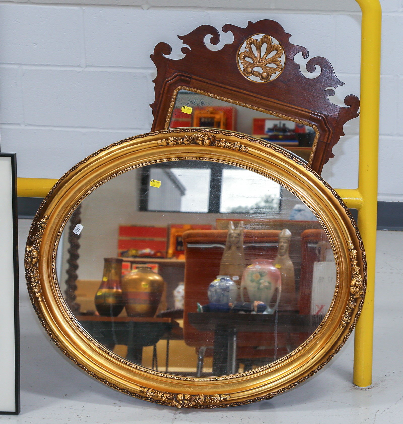 TWO FRAMED MIRRORS Including a