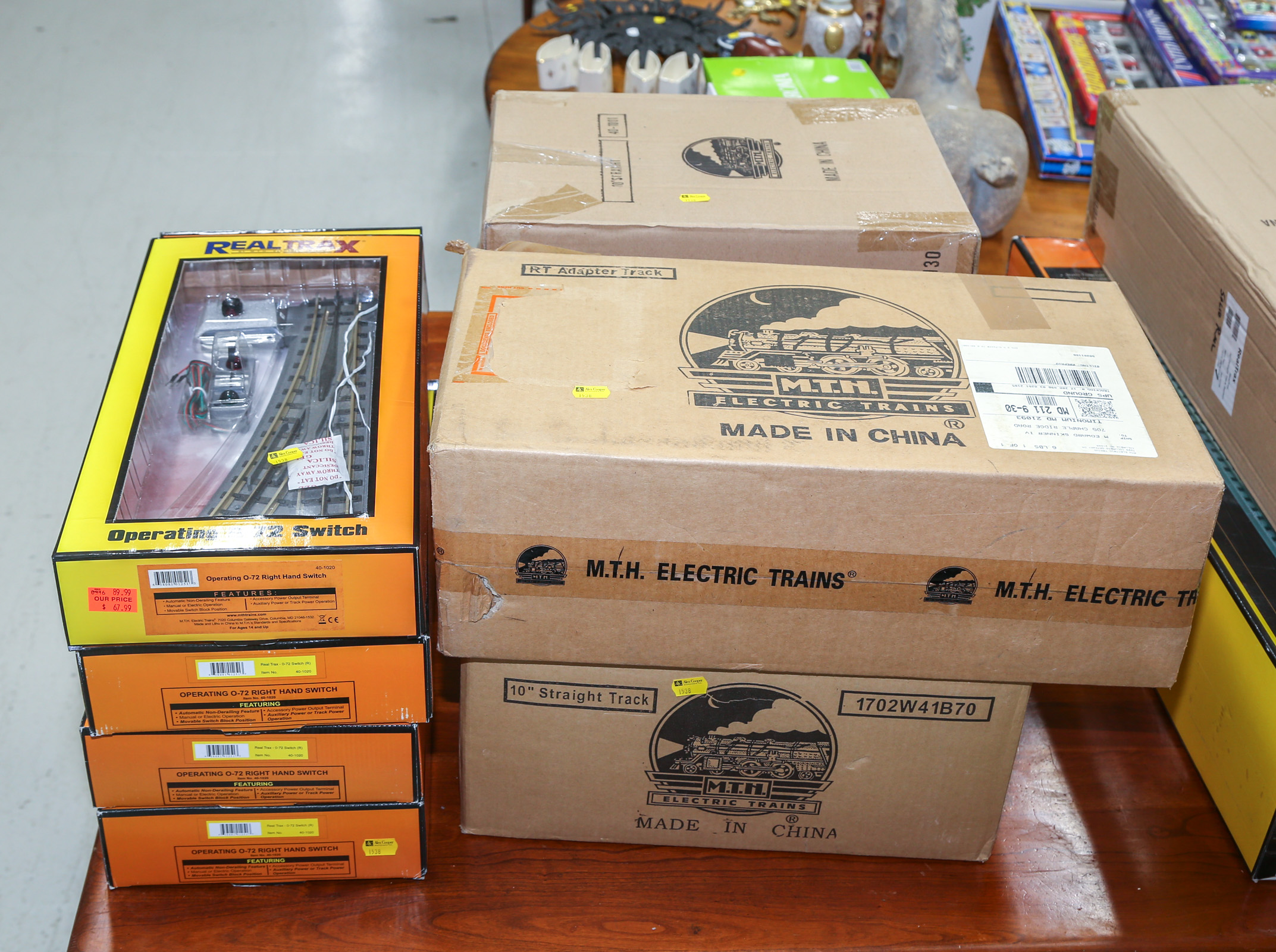 FOUR BOXES OF MTH TACK & FOUR OPERATING