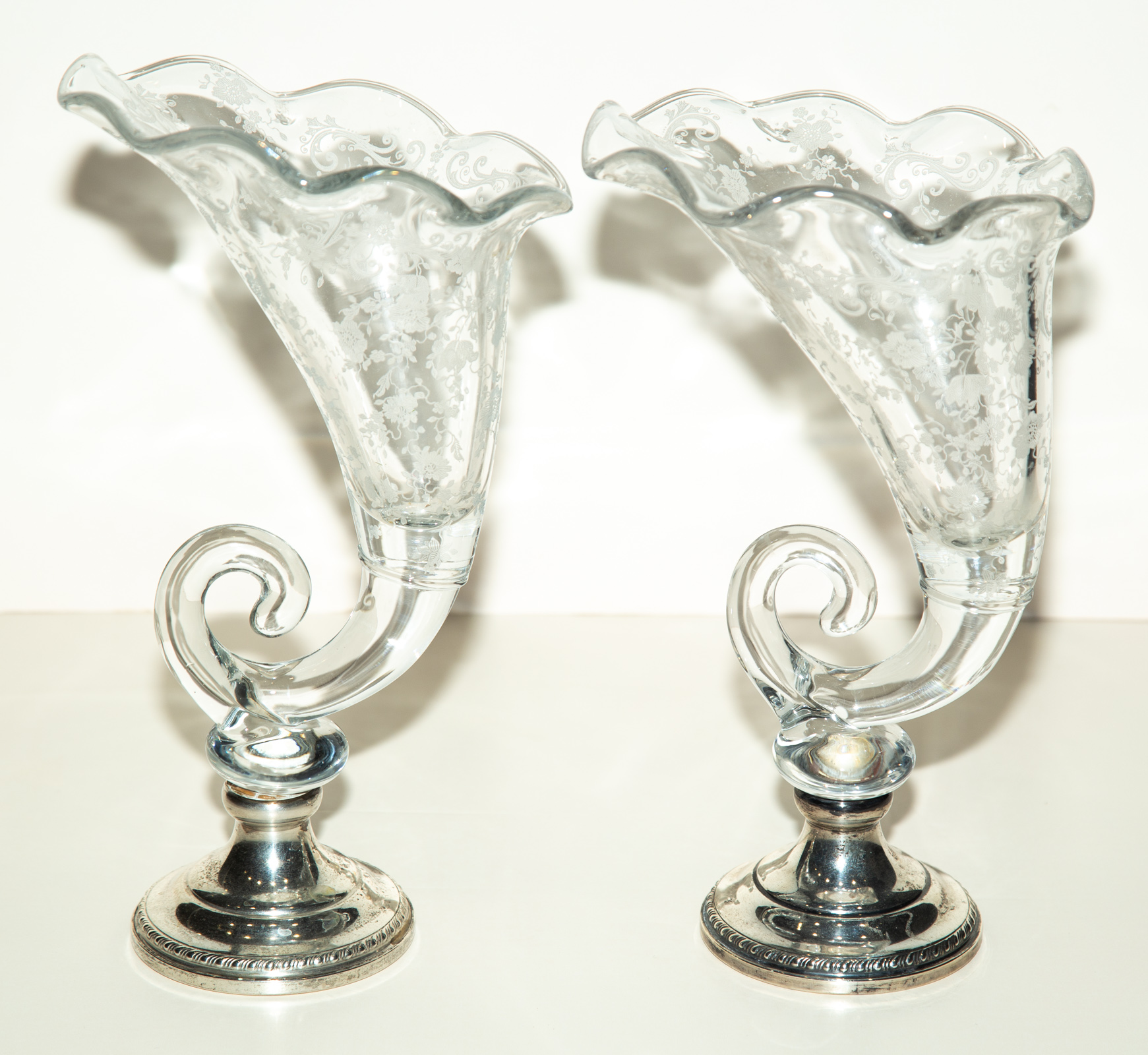 A PAIR OF GLASS & SILVER MANTEL