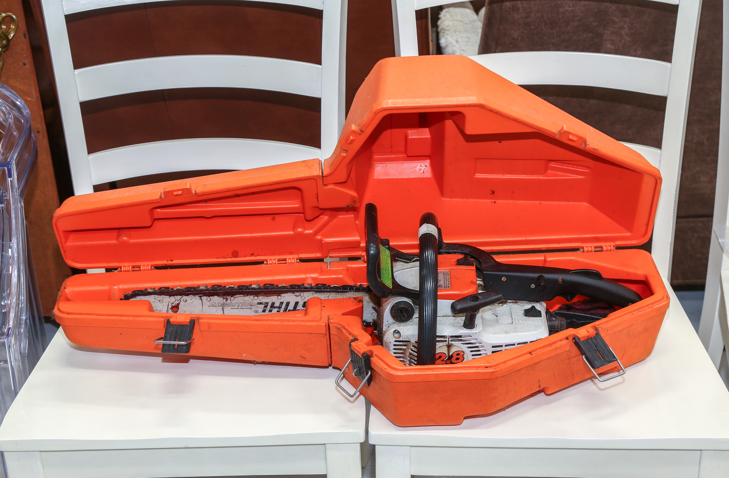 A STIHL 012 AV GAS CHAIN SAW IN