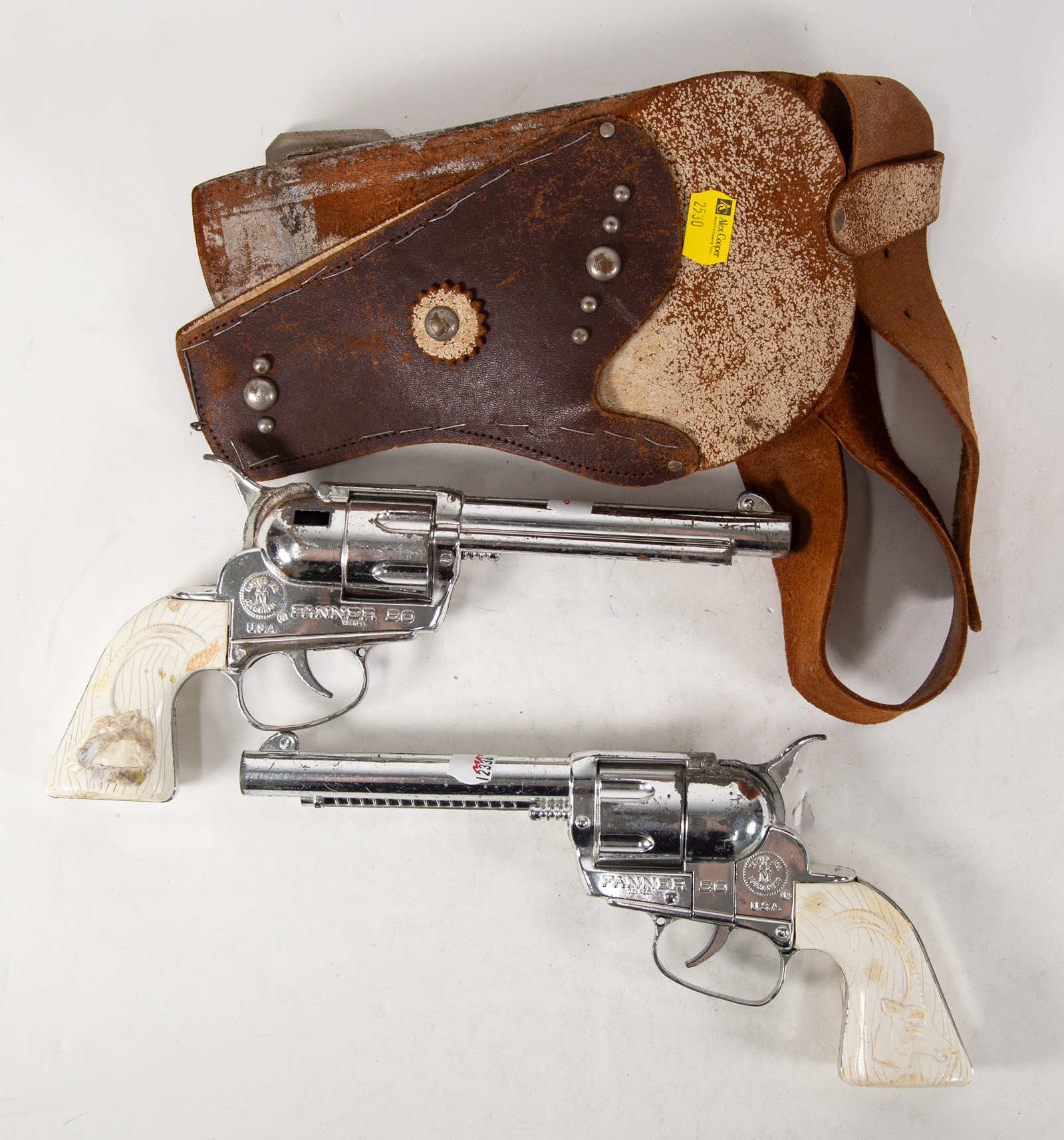 A PAIR OF MATEL FANNER TOY PISTOLS 2eaaf7