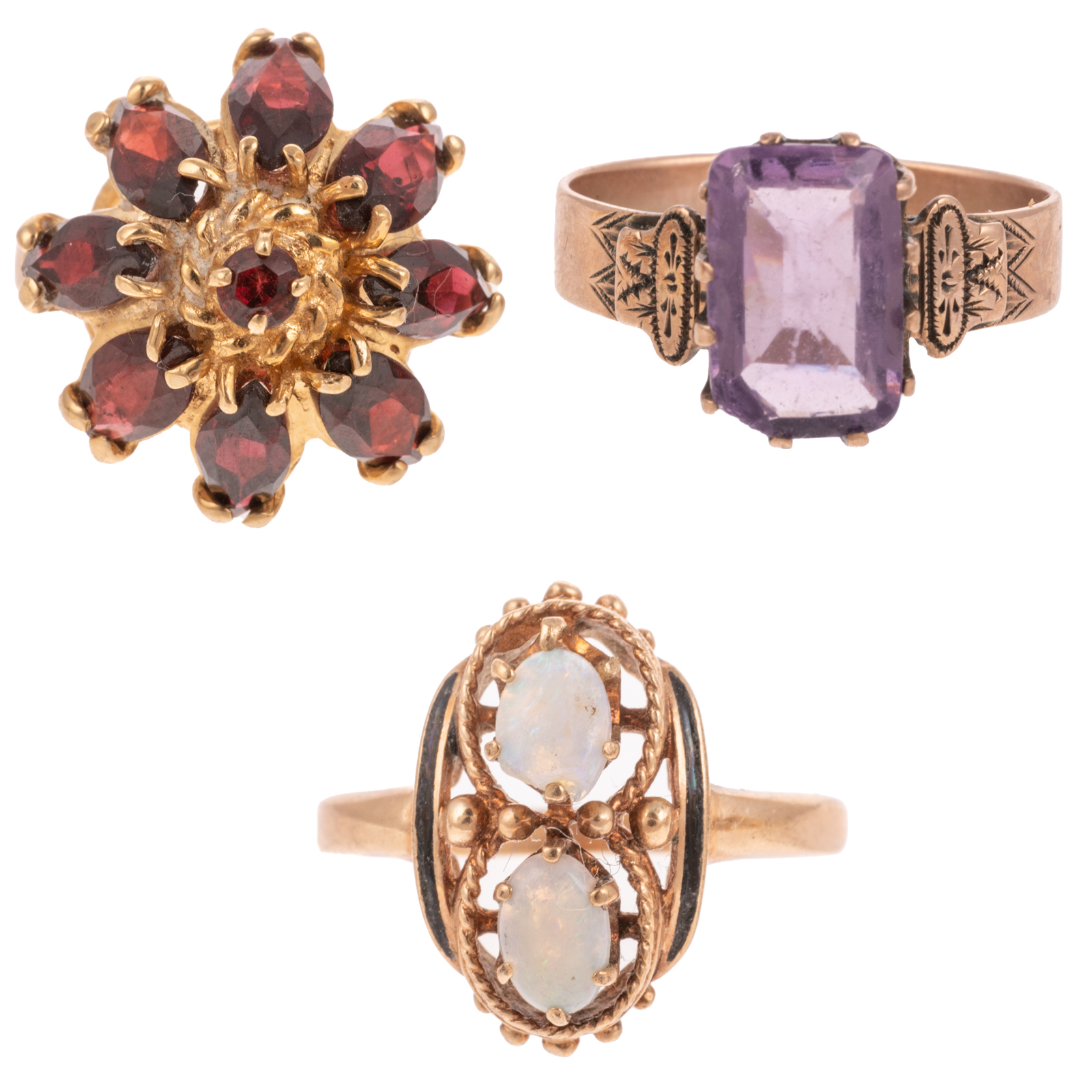 A TRIO OF GEMSTONE RINGS IN GOLD 2ead56